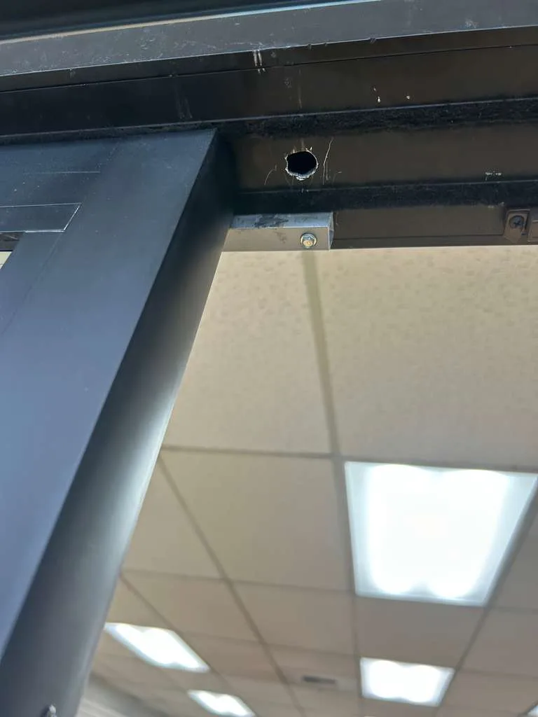 Commercial door hinge mounting holes for bolts