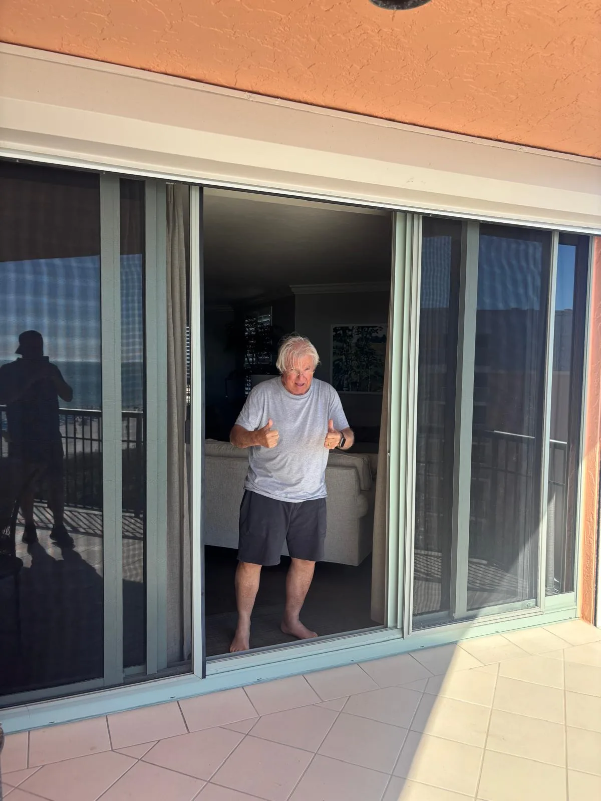 Happy customer after door closer installation